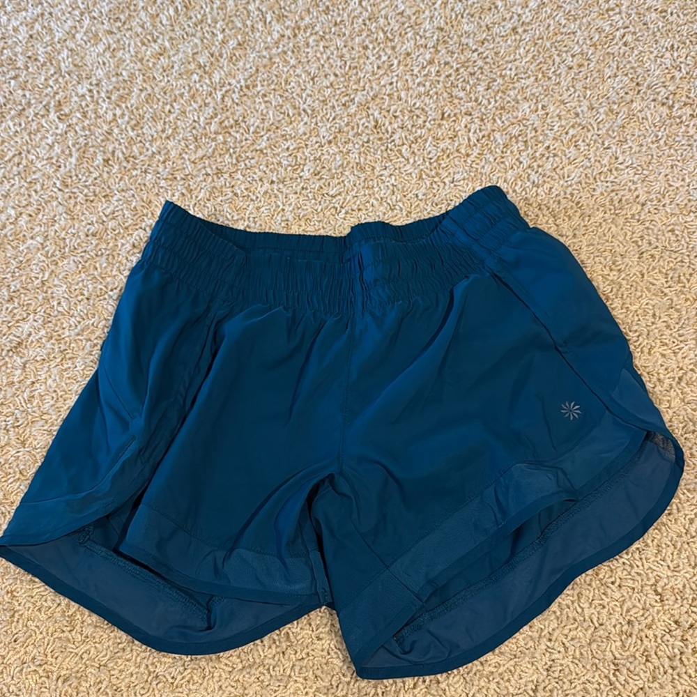Athleta teal shorts. Size extra small.